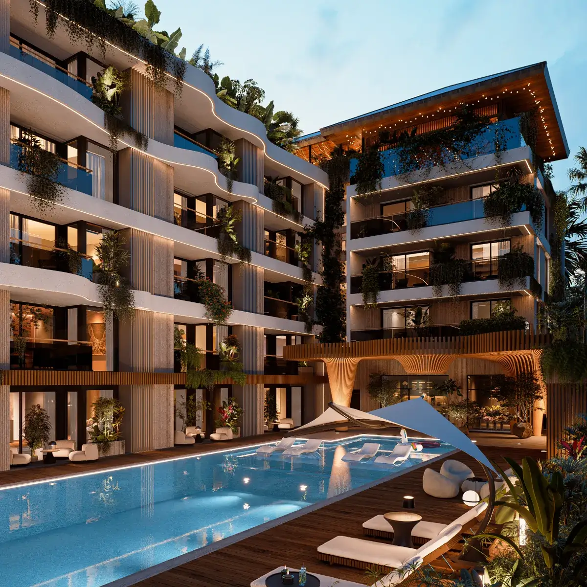 Luxurious apartment building with illuminated balconies and greenery surrounding a swimming pool, featuring modern lounge chairs and a shaded seating area.