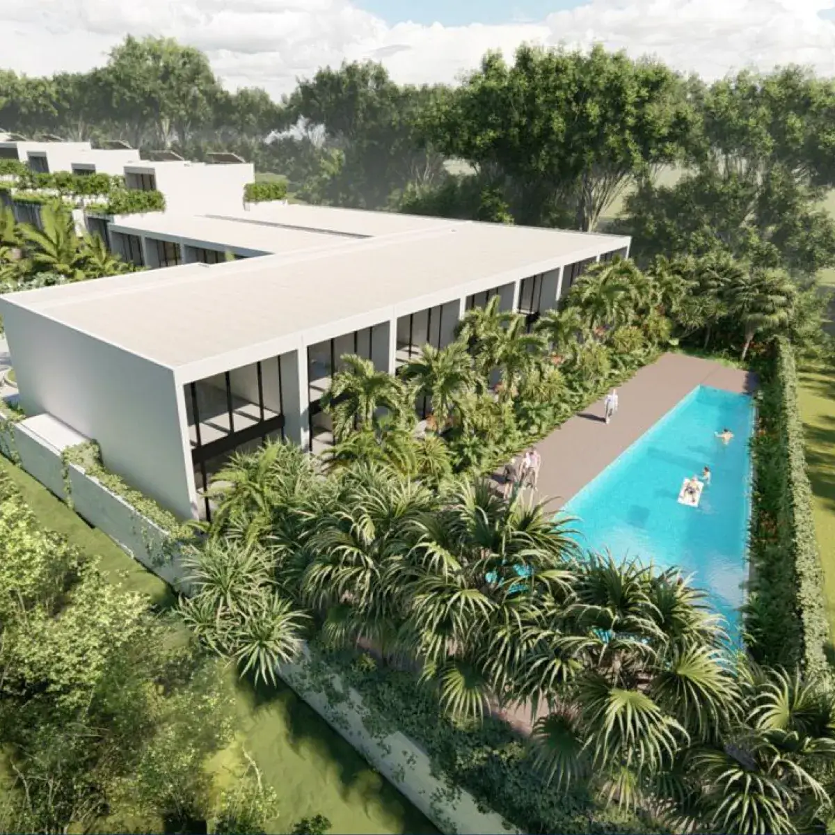 Aerial view of modern single-story villas with large windows surrounded by lush greenery, featuring a swimming pool with lounge areas.